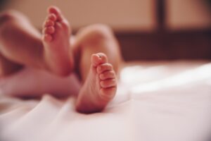 Close up of infant baby feet.