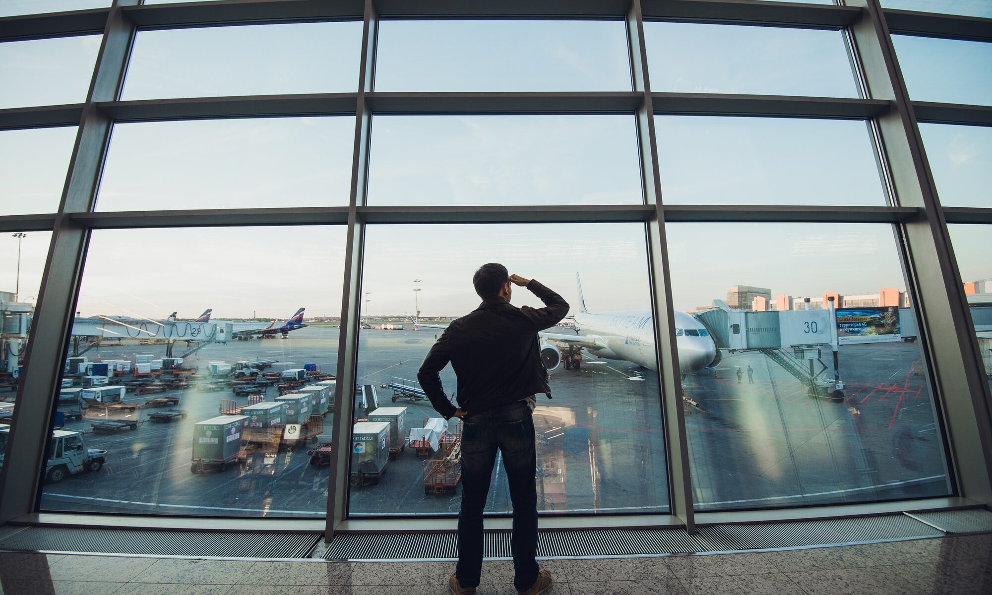 Silhouette of man waiting for the flight